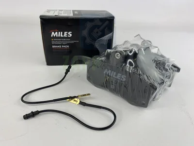 Колодки тормозные передние (с датчиком) (смесь Low-Metallic) Miles - ВАЗ 2110, 2111, 2112 (oem: TRW GDB1446)
